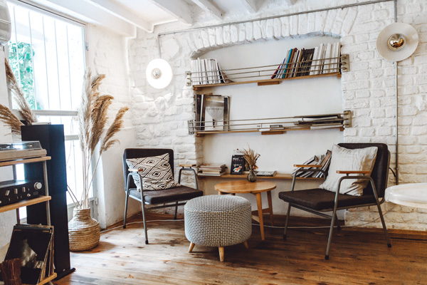 Exposed brick loft living room with contemporary furniture.